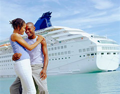 couple in love with cruise ship in background